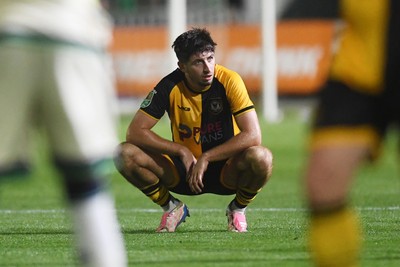 120825 - Newport County v Millwall - Carabao Cup Round 1 - Dejected Anthony Glennon of Newport County at full time
