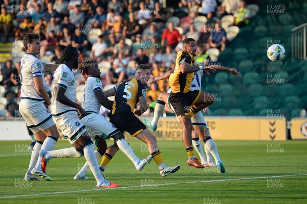 120825 - Newport County v Millwall - Carabao Cup Round 1 - James Clarke of Newport County heads at goal