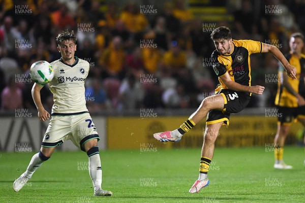 120825 - Newport County v Millwall - Carabao Cup Round 1 - Anthony Glennon of Newport County has a shot from distance