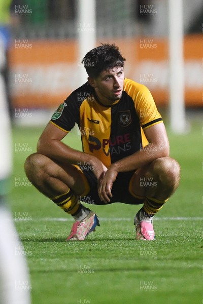 120825 - Newport County v Millwall - Carabao Cup Round 1 - Dejected Anthony Glennon of Newport County at full time