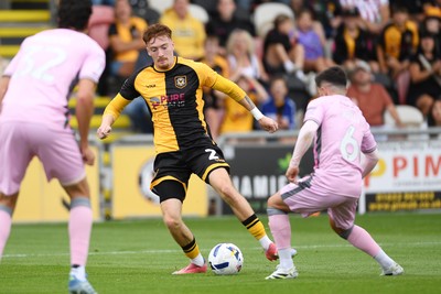 230825 - Newport County v Milton Keynes Dons - Sky Bet League 2 - Michael Spellman of Newport County