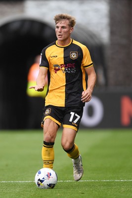 230825 - Newport County v Milton Keynes Dons - Sky Bet League 2 - Tom Davies of Newport County