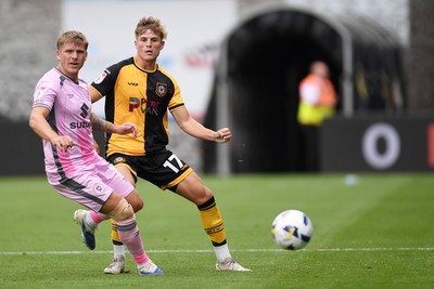 230825 - Newport County v Milton Keynes Dons - Sky Bet League 2 - Tom Davies of Newport County