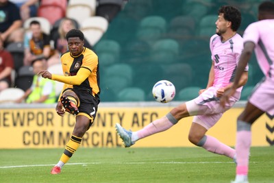230825 - Newport County v Milton Keynes Dons - Sky Bet League 2 - Bobby Kamwa of Newport County has a shot on goal