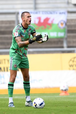 230825 - Newport County v Milton Keynes Dons - Sky Bet League 2 - Nik Tzanev of Newport County