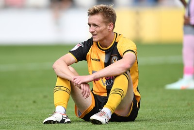 230825 - Newport County v Milton Keynes Dons - Sky Bet League 2 - Dejected Matt Smith of Newport County