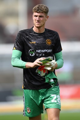 230825 - Newport County v Milton Keynes Dons - Sky Bet League 2 - Jordan Wright of Newport County applauding fans