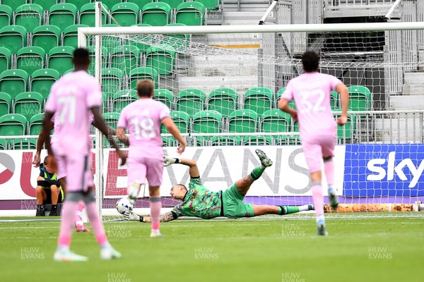 230825 - Newport County v Milton Keynes Dons - Sky Bet League 2 - Nathaniel Mendez-Laing of MK Dons scores his penalty from the spot to equalise the game on half time
