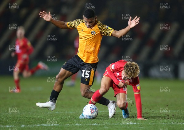 070120 - Newport County v MK Dons - Leasingcom Trophy - Matt Sorinola of MK Dons is challenged by Tristan Abrahams of Newport County
