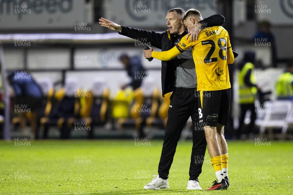 111123 - Newport County v MK Dons - Sky Bet League 2 - Newport County manager Graham Coughlan with Matthew Baker of Newport County at full time