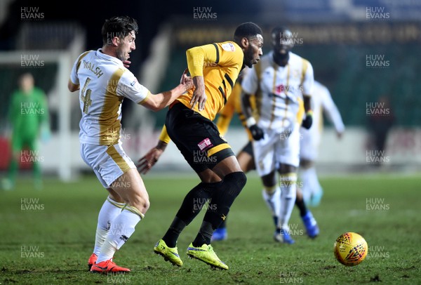120219 - Newport County v MK Dons - SkyBet League 2 - Jamille Matt of Newport County is tackled by Joe Walsh of MK Dons