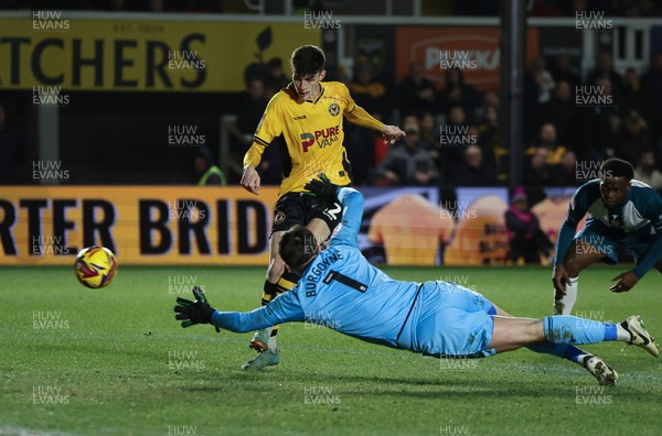 040225  Newport County v Morecambe, EFL Sky Bet League 2 - Joe Thomas of Newport County beats Morecambe goalkeeper Harry Burgoyne to score the opening goal