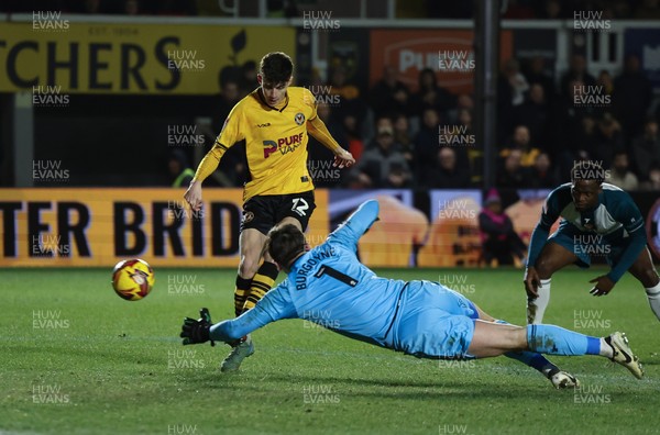 040225  Newport County v Morecambe, EFL Sky Bet League 2 - Joe Thomas of Newport County beats Morecambe goalkeeper Harry Burgoyne to score the opening goal