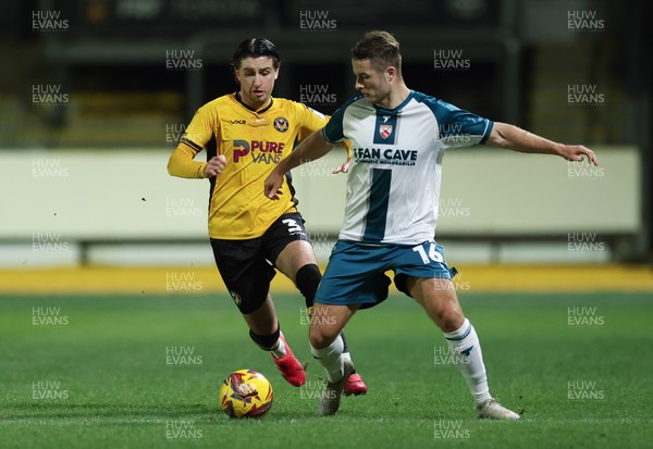 040225  Newport County v Morecambe, EFL Sky Bet League 2 - Anthony Glennon of Newport County and Andrew Dallas of Morecambe compete for the ball