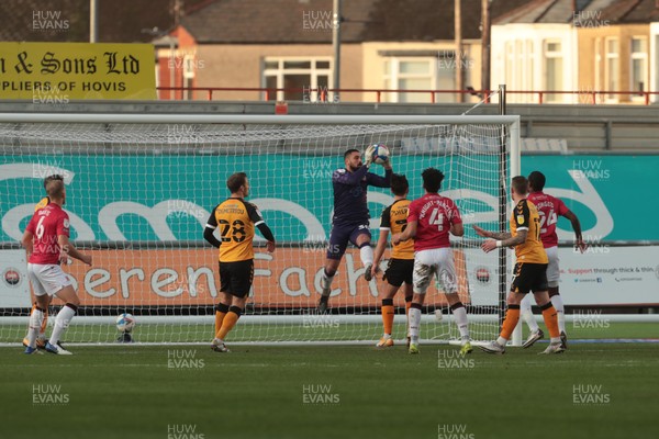 051220 - Newport County v Morecambe - Sky Bet League 2 - Nick Townsend of Newport County saves from a Yann Songo'o of Morecambe header