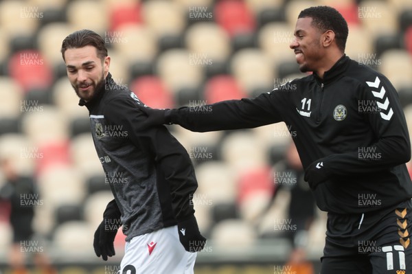 051220 - Newport County v Morecambe - Sky Bet League 2 - Saikou Janneh and Tristan Abrahams of Newport County share a joke during the warm up