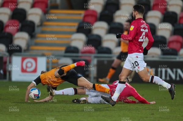 051220 - Newport County v Morecambe - Sky Bet League 2 - Scott Twine of Newport County is brought down by Alex Kenyon of Morecambe