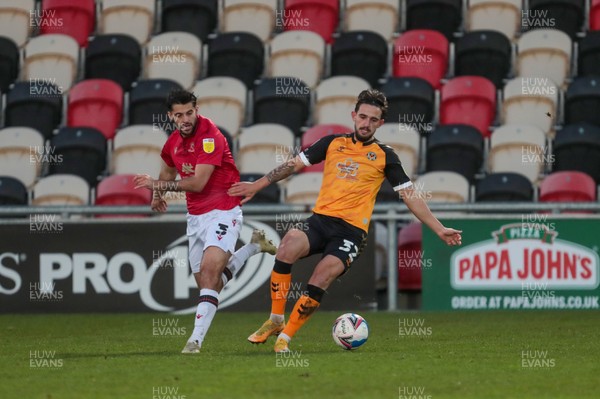 051220 - Newport County v Morecambe - Sky Bet League 2 - Stephen Hendrie of Morecambe and Liam Shephard of Newport County challenge for the ball