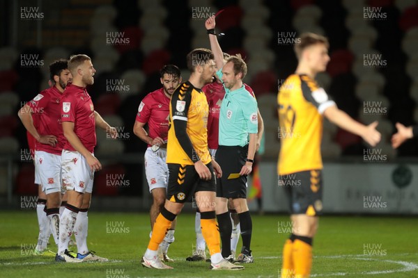 051220 - Newport County v Morecambe - Sky Bet League 2 - Stephen Hendrie of Morecambe is shown a red card by referee Sam Purkiss