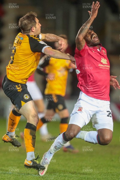 051220 - Newport County v Morecambe - Sky Bet League 2 - Kelvin Mellor of Morecambe is pushed off the ball by Matthew Dolan of Newport County