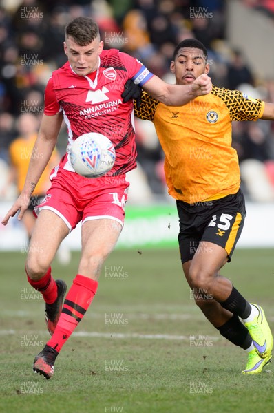 070320 - Newport County v Morecambe - Sky Bet League 2 - Tristan Abrahams of Newport County and Sam Lavelle of Morecambe compete for the ball 