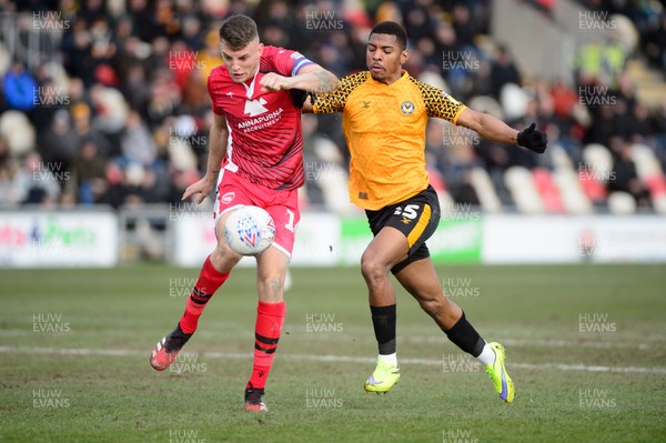 070320 - Newport County v Morecambe - Sky Bet League 2 - Tristan Abrahams of Newport County and Sam Lavelle of Morecambe compete for the ball 