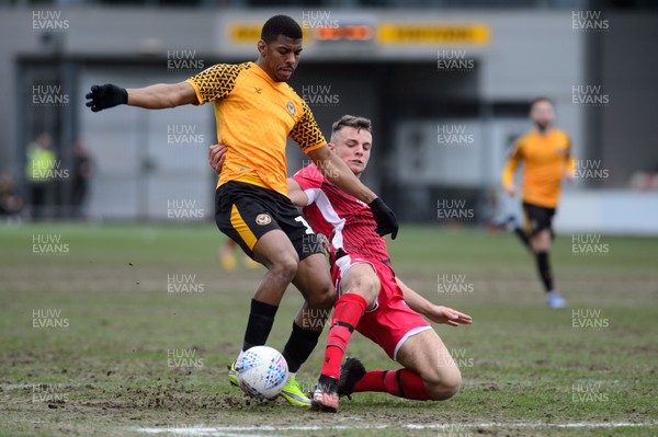 070320 - Newport County v Morecambe - Sky Bet League 2 - Tristan Abrahams of Newport County is tackled by Sam Lavelle of Morecambe 