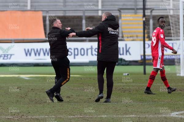 070320 - Newport County v Morecambe - Sky Bet League 2 - Mike Flynn manager of Newport County and a member of the Morecambe staff clash after the final whistle 