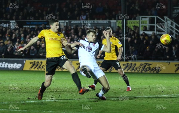 230118 - Newport County v Morecambe, SkyBet League 2 - Ben Tozer of Newport County shoots to score the opening goal