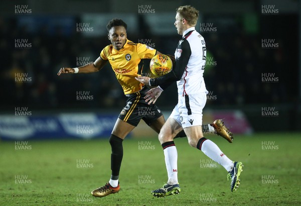 230118 - Newport County v Morecambe, SkyBet League 2 - Shawn McCoulsky of Newport County and Steven Old of Morecambe compete for the ball