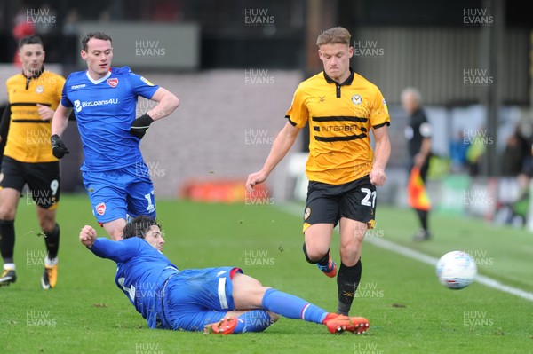 271018 - Newport County v Morecambe  Rovers - Sky Bet League 2 - Cameron Pring of Newport County is tackled by Zak Mills of Morecambe  