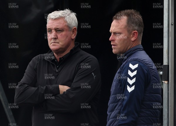 300920 - Newport County v Newcastle United - Carabao Cup - Newcastle United Manager Steve Bruce and Newport County Manager Michael Flynn before the game