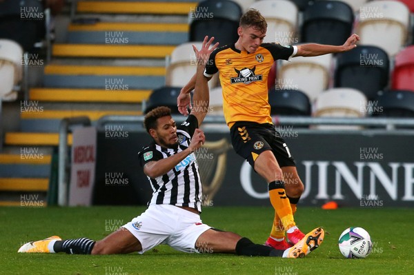 300920 - Newport County v Newcastle United - Carabao Cup - Joelinton of Newcastle United is tackled by Scott Twine of Newport Count