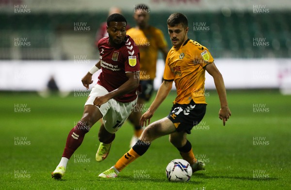 140921 - Newport County v Northampton Town, Sky Bet League 2- Lewis Collins of Newport County challenges Ali Koiki of Northampton Town