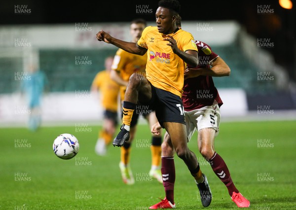 140921 - Newport County v Northampton Town, Sky Bet League 2 - Timmy Abraham of Newport County wins the ball from Jon Guthrie of Northampton Town