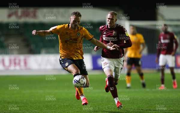 140921 - Newport County v Northampton Town, Sky Bet League 2 - Cameron Norman of Newport County lholds off Mitch Pinnock of Northampton Town