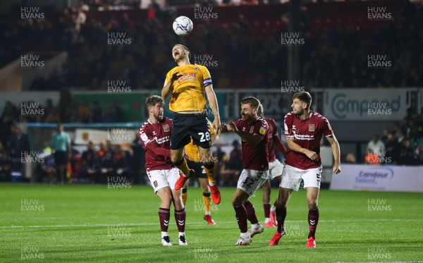 140921 - Newport County v Northampton Town, Sky Bet League 2 - Mickey Demetriou of Newport County tries to get a headed attempt at goal