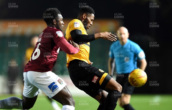 271118 - Newport County v Northampton Town - SkyBet League 2 - Jamille Matt of Newport County is tackled by Aaron Pierre of Northampton Town