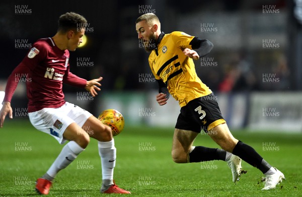 271118 - Newport County v Northampton Town - SkyBet League 2 - Dan Butler of Newport County tries to get past Shaun McWilliams of Northampton Town
