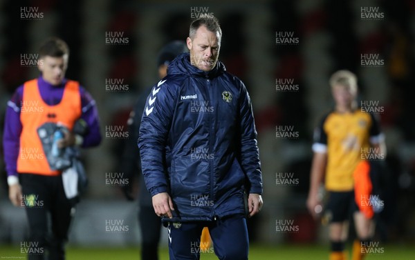061020 - Newport County v Norwich City U21,  EFL Trophy - Newport County manager Michael Flynn walks back to the changing room at the end of the match which his team lost by 5 goals to nil