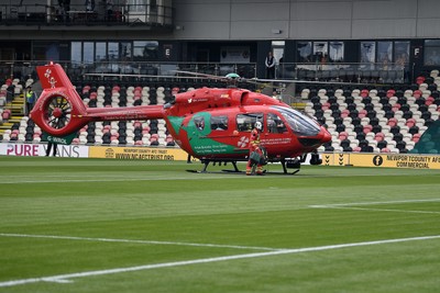 020825 - Newport County v Notts County - Sky Bet League 2 - An Emergency Helicopter lands on the pitch at Rodney Parade after a serious medical incident with a Notts County fan before the match, causing evacuation of the stadium