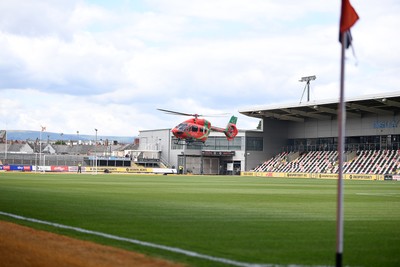 020825 - Newport County v Notts County - Sky Bet League 2 - An Emergency Helicopter lands on the pitch at Rodney Parade after a serious medical incident with a Notts County fan before the match, causing evacuation of the stadium