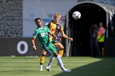 020825 - Newport County v Notts County - Sky Bet League 2 - Tom Davies of Newport County is challenged by Jacob Bedeau of Notts County