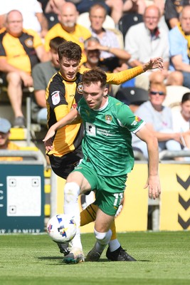 020825 - Newport County v Notts County - Sky Bet League 2 - Joe Thomas of Newport County is challenged by Conor Grant of Notts County