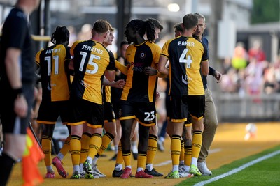 020825 - Newport County v Notts County - Sky Bet League 2 - Ged Garner of Newport County celebrates with team mates after he scores the first goal of the game