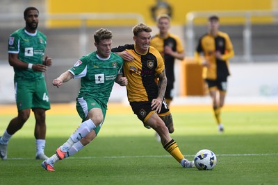 020825 - Newport County v Notts County - Sky Bet League 2 - Kai Whitmore of Newport County is challenged by Matt Palmer of Notts County