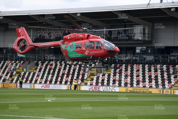 020825 - Newport County v Notts County - Sky Bet League 2 - An Emergency Helicopter lands on the pitch at Rodney Parade after a serious medical incident with a Notts County fan before the match, causing evacuation of the stadium