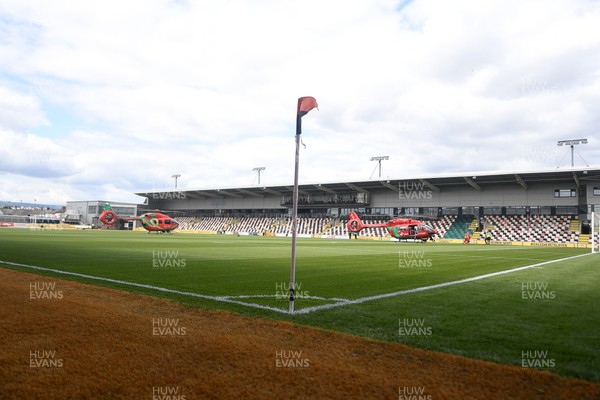 020825 - Newport County v Notts County - Sky Bet League 2 - An Emergency Helicopter lands on the pitch at Rodney Parade after a serious medical incident with a Notts County fan before the match, causing evacuation of the stadium
