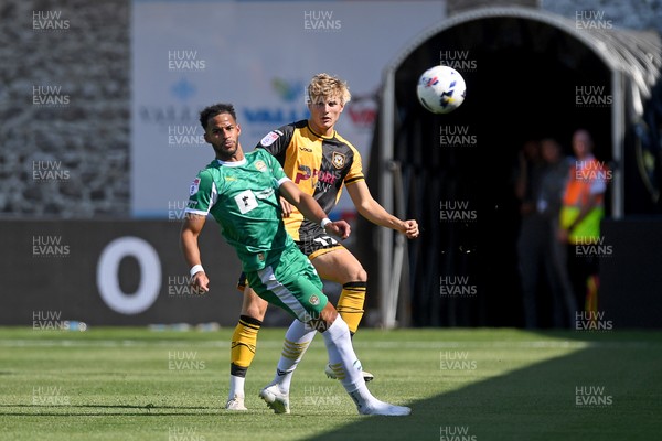 020825 - Newport County v Notts County - Sky Bet League 2 - Tom Davies of Newport County is challenged by Jacob Bedeau of Notts County