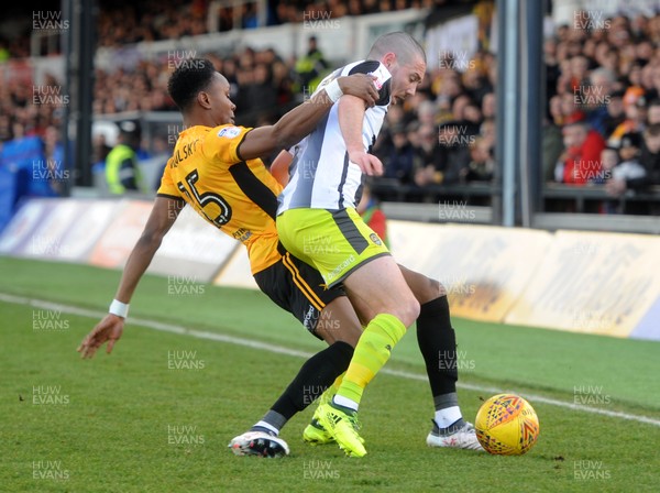 170218 - Newport County v Notts County - Sky Bet League 2 -  Shawn McCoulsky of Newport County tackles Liam Noble of Notts County